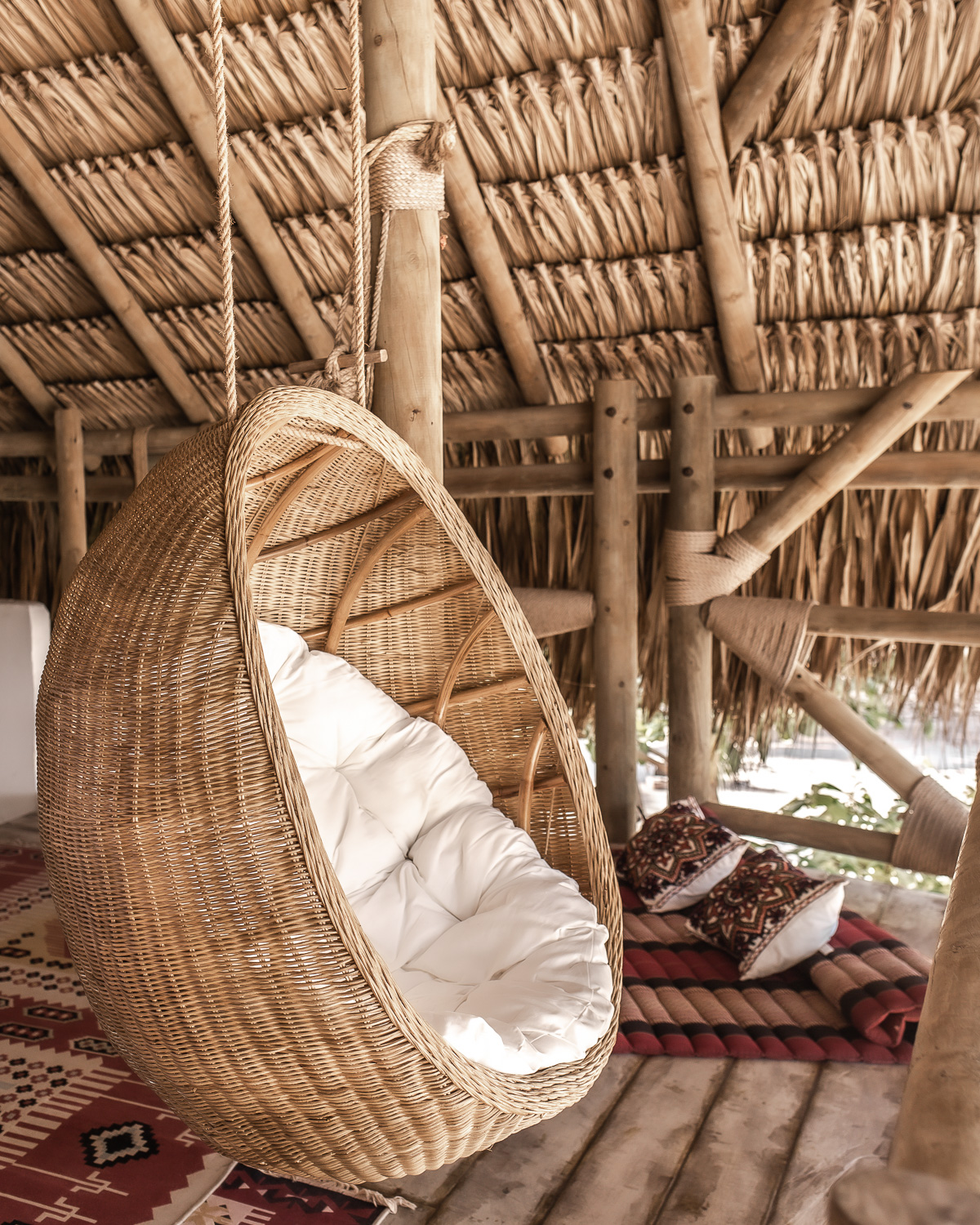 Rattan nest hammocks featured on the deck above the lobby at Eteka Beach Lounge & Hotel - Cartagena, Colombia