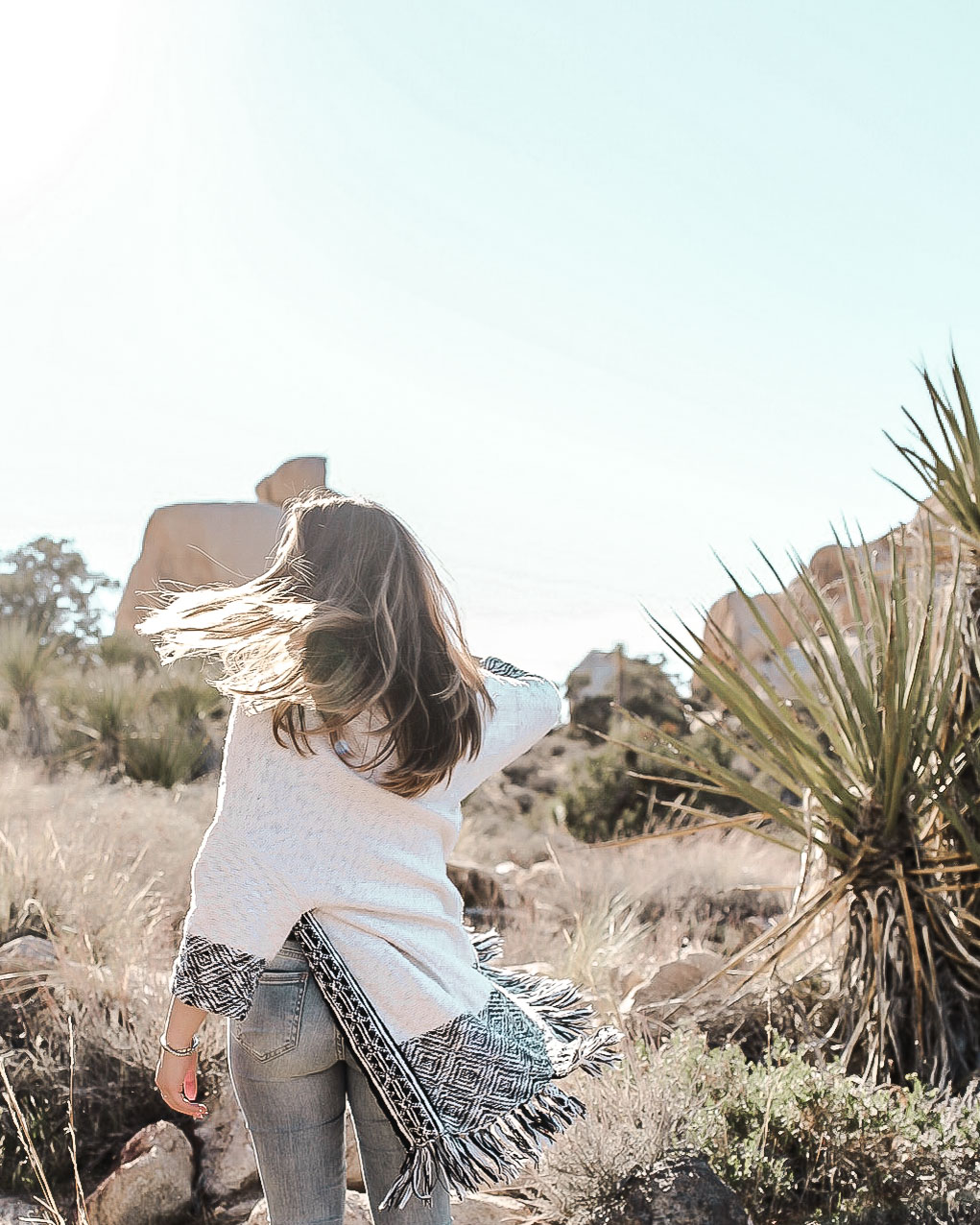 Rylie doing a hair flip in Quail Springs, Joshua Tree.