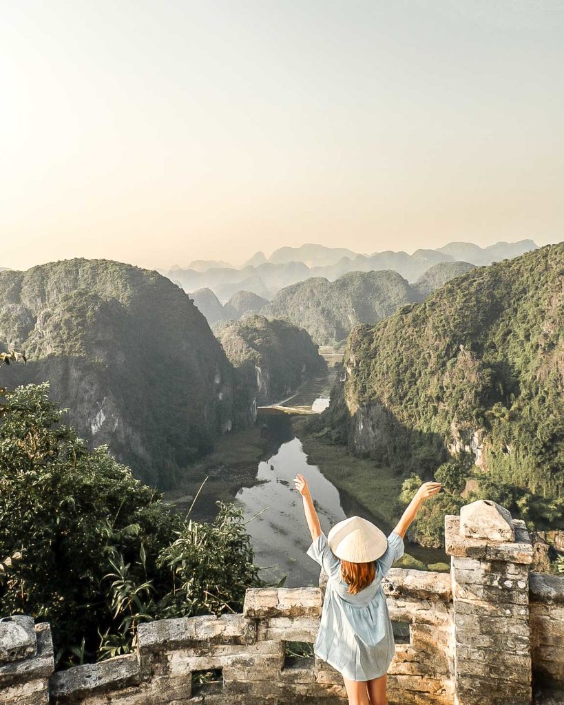 Exploring the top of Hang Mua caves at sunrise - one of the most beautiful places in Ninh Binh, Vietnam.