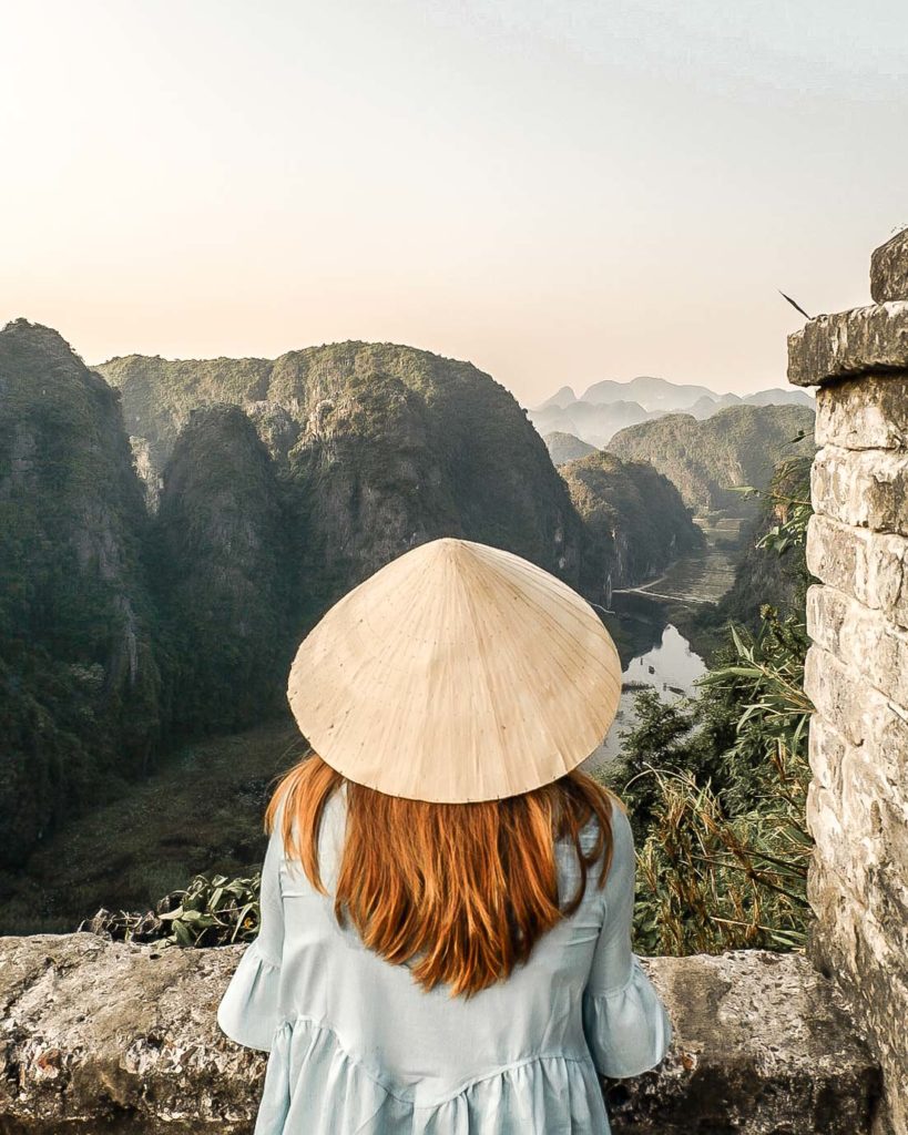 Exploring the top of Hang Mua caves at sunrise - one of the most beautiful places in Ninh Binh, Vietnam.