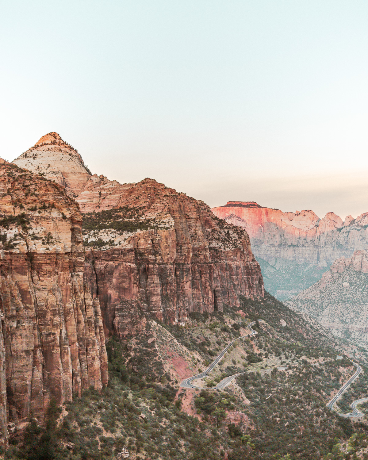 Zion Canyon Overlook Trail · Zion National Park · Sunrise views overlooking Pine Creek Canyon at the trail's viewpoint.
