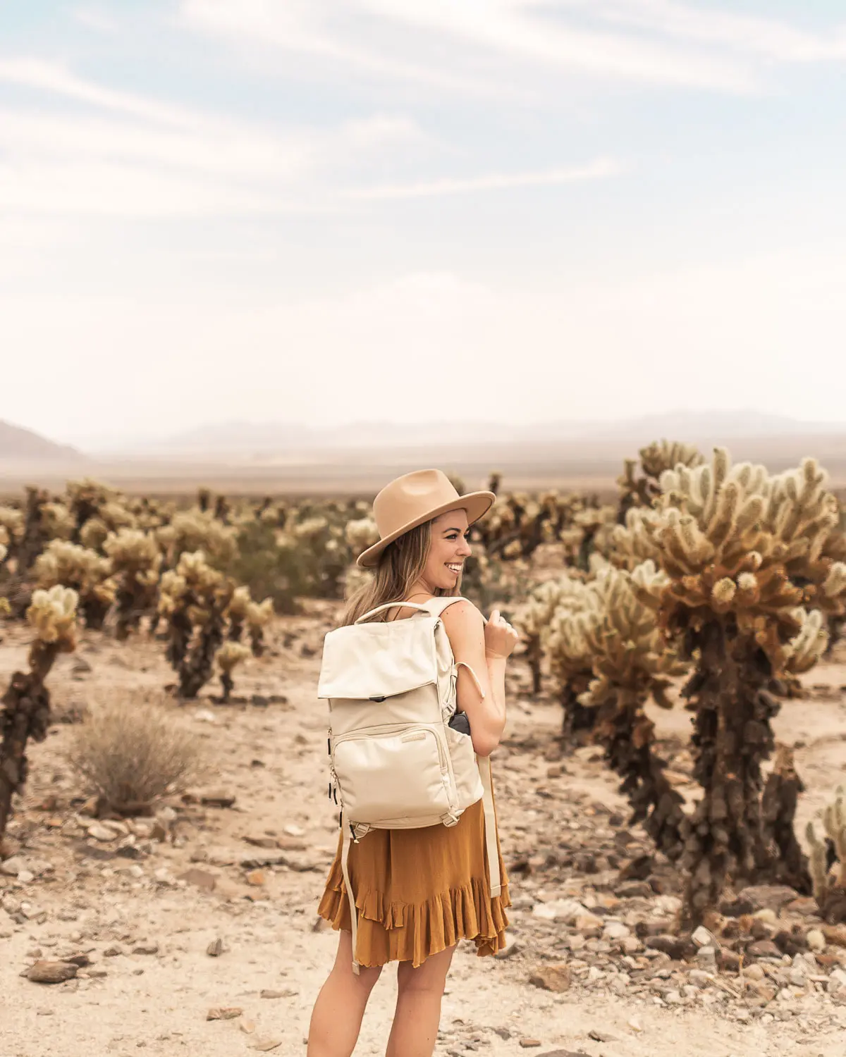 Travel bloggers camera gear · The best travel camera bag that holds all my gear for my photography trips as a blogger. Pictured: Brevitē "The Runner" backpack in Boulder Tan color.